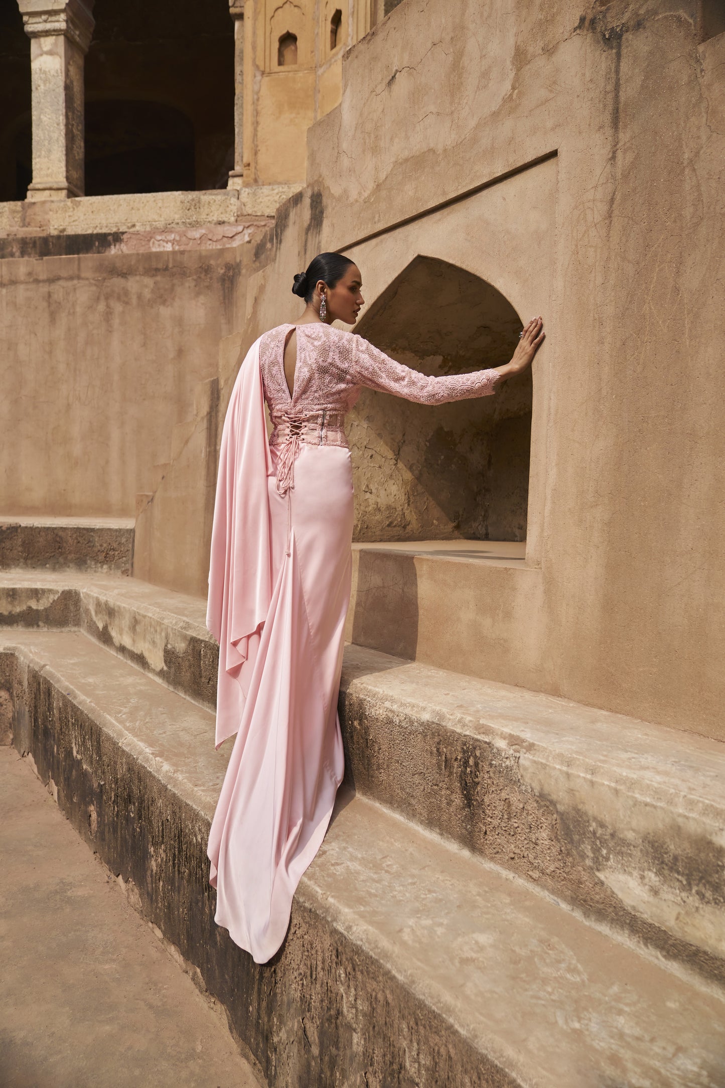Silken stardust full sleeves blouse, drape saree and corset belt set