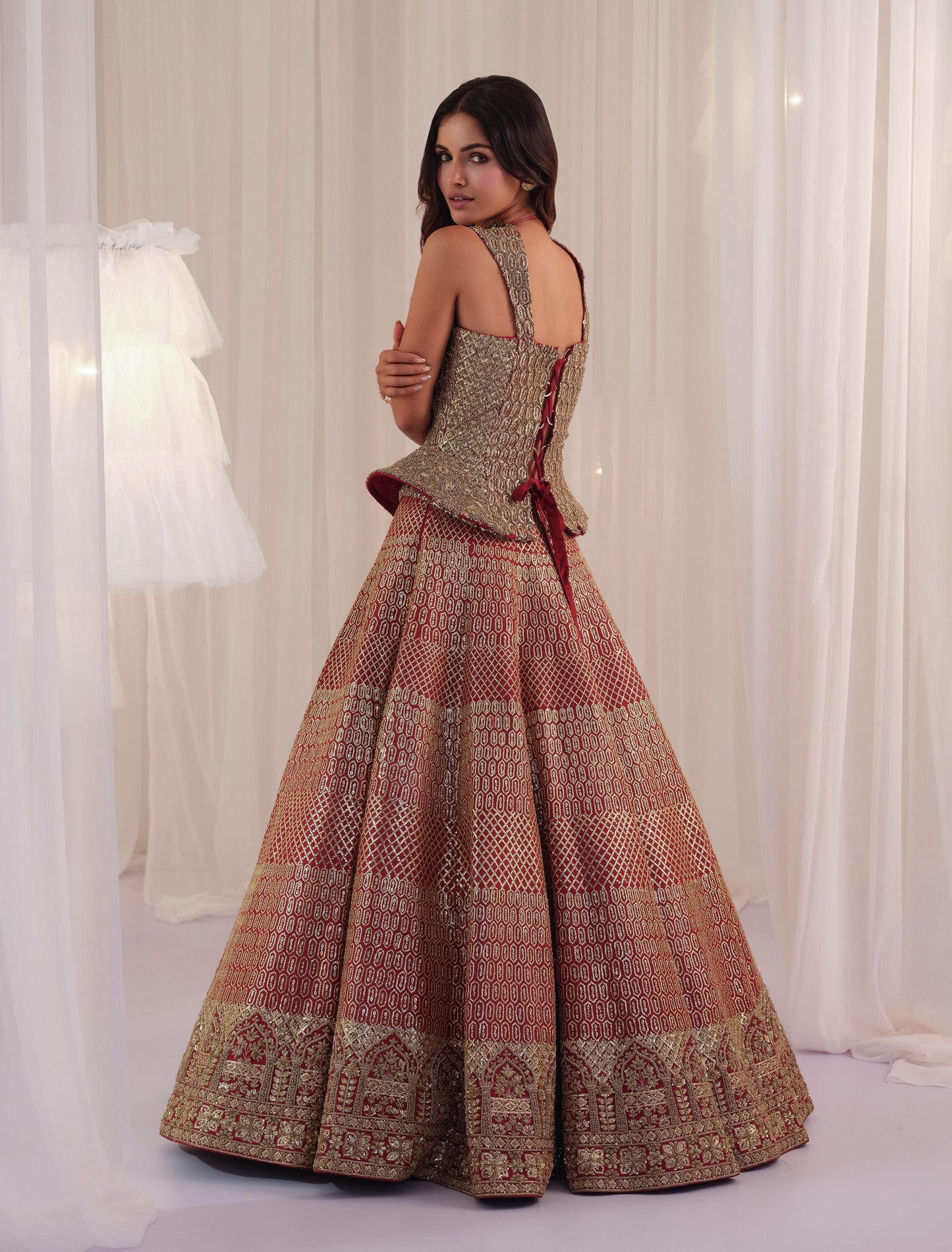 Maroon Raw Silk Lehenga With Peplum Sculpt Corset & Dupatta
